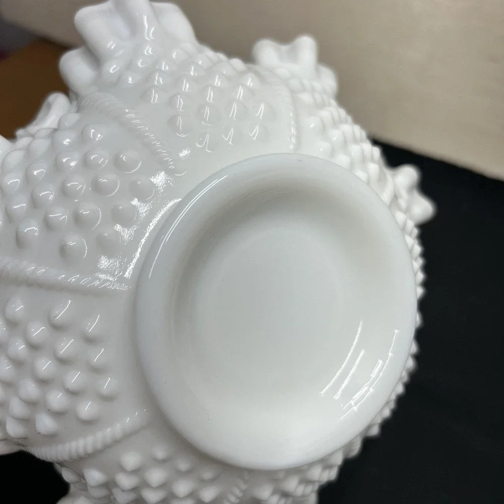Vintage Fenton Hobnail White Milk Glass Basket with a ruffled edge and handle